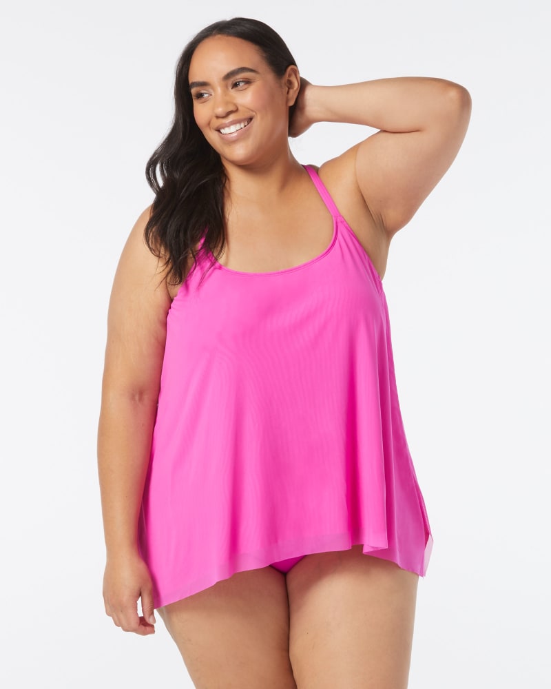 Front of a model wearing a size 32C CURRENT TANKINI in PINK TROPICS by Coco Reef. | dia_product_style_image_id:332712